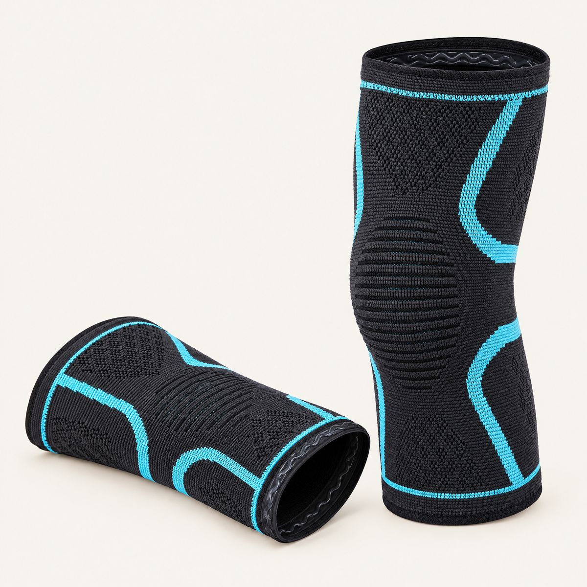 Black knitted compression knee sleeves with cyan accent lines